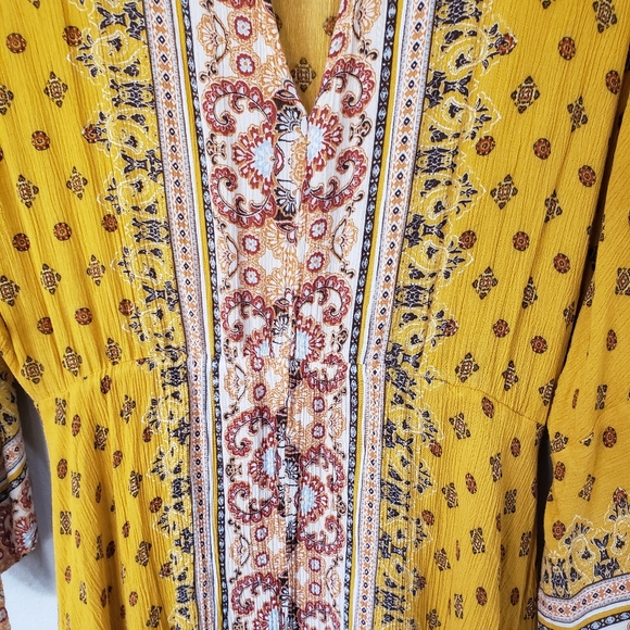 Coco+Jaimeson Large Boho Style Dress with Bell Sleeves and a Handkerchief Hem - Picture 5 of 6